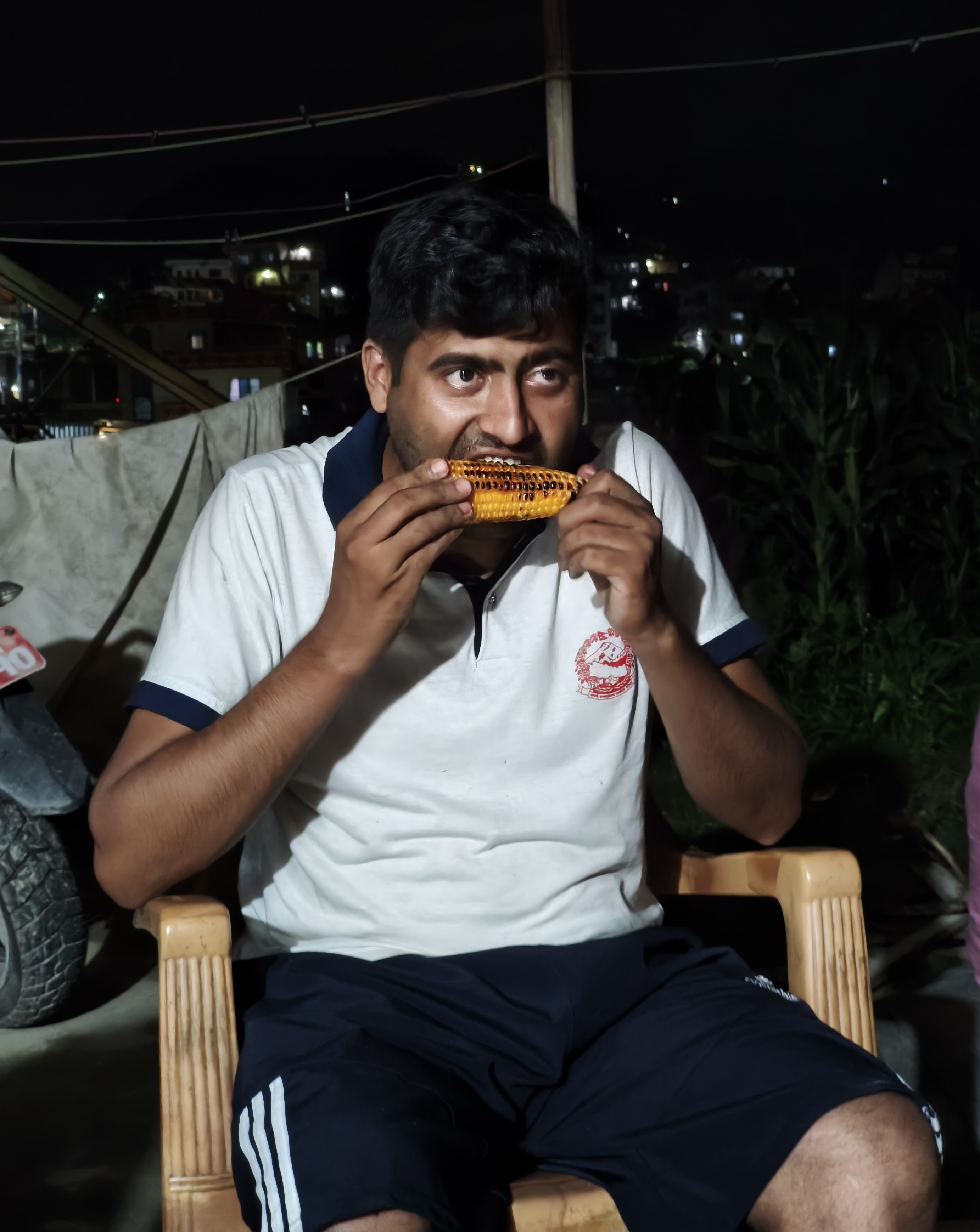 Enjoying roasted corn